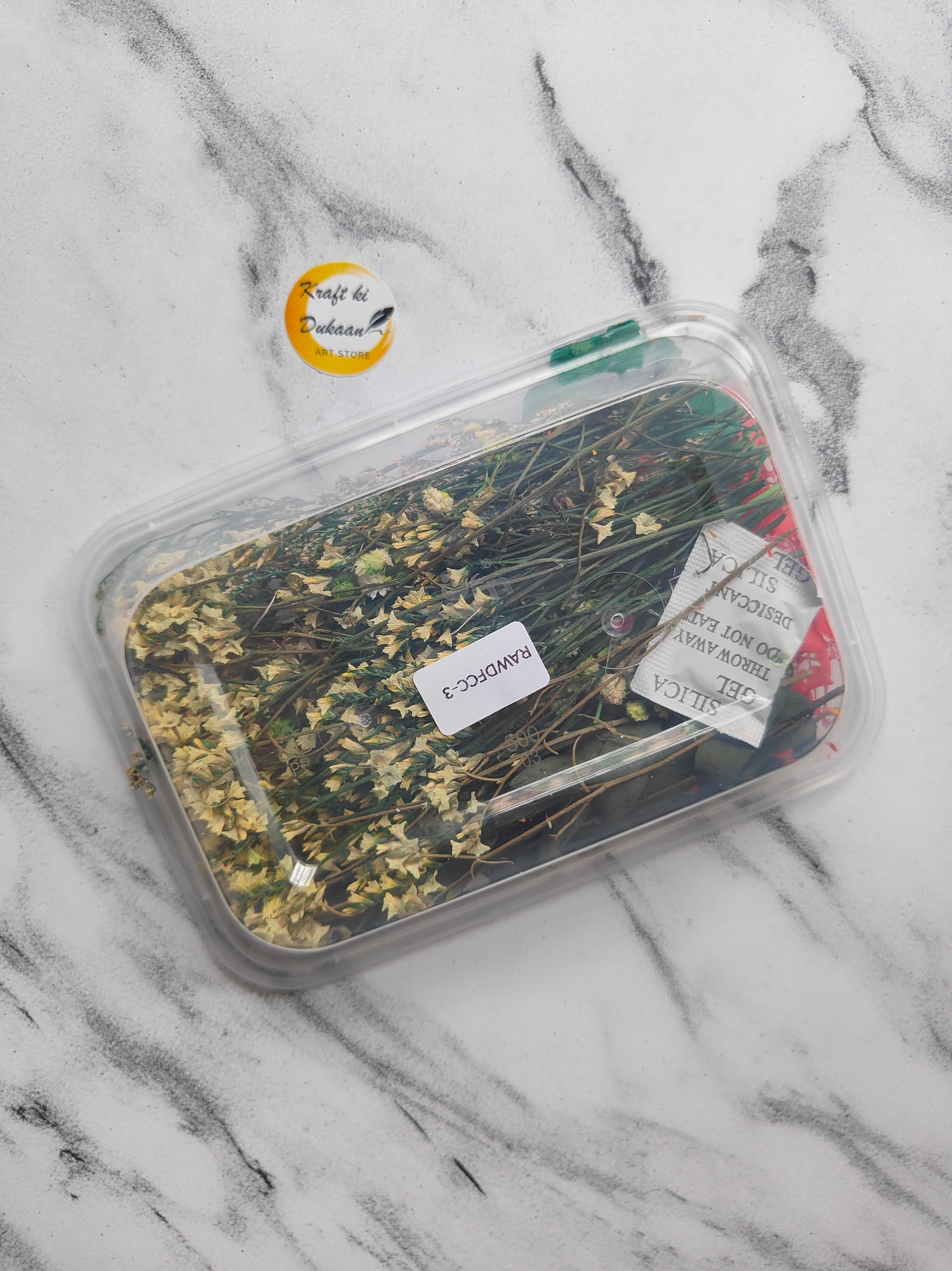 Pressed dry flower box for resin art featuring assorted dried flowers in a clear container