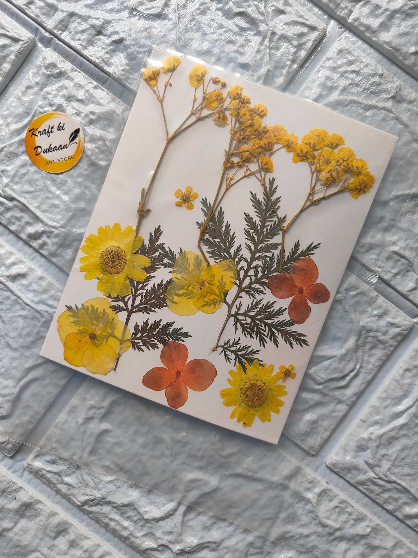 Mix pressed flower sheet for resin featuring vibrant yellow and orange flowers and green leaves
