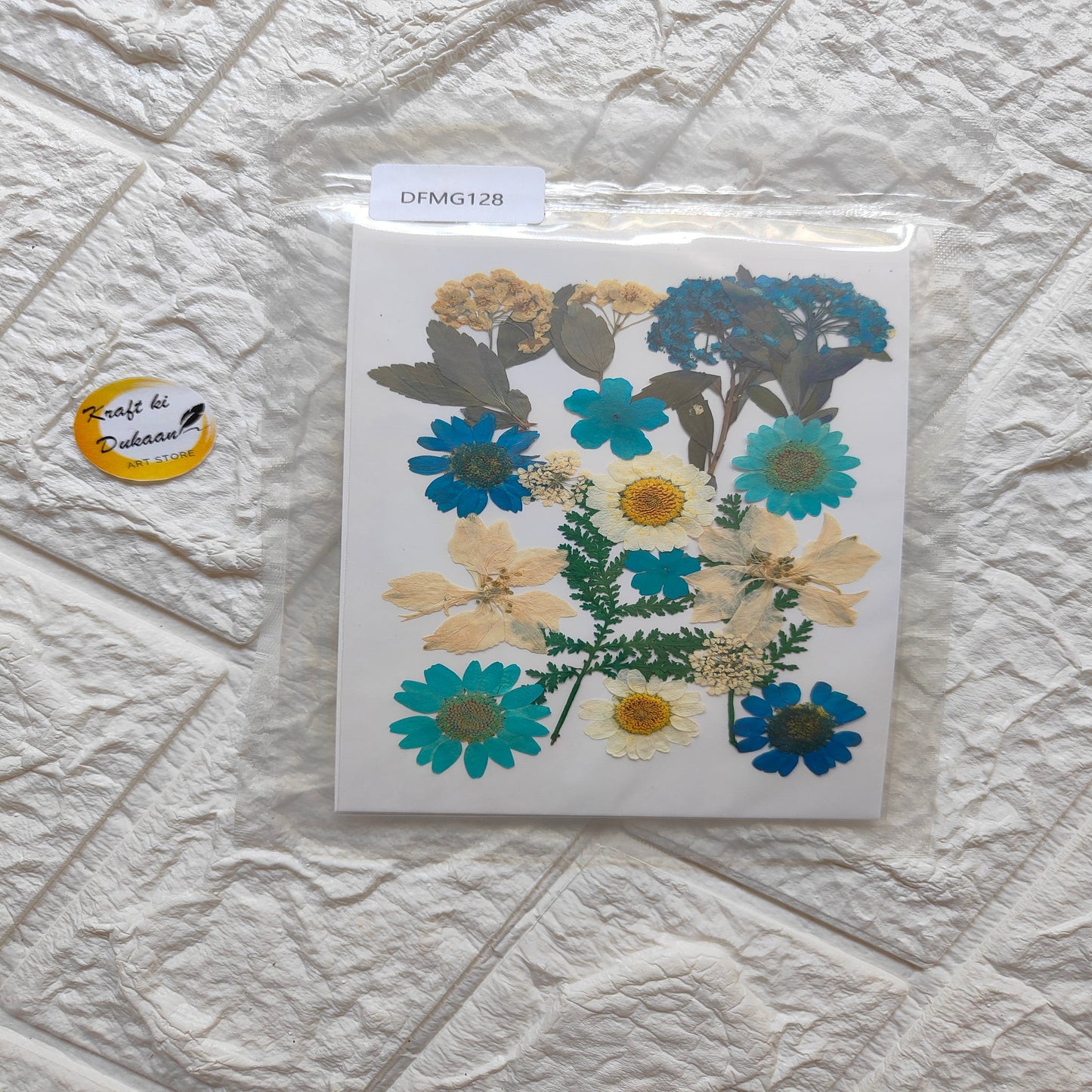 Pressed flower sheet mix for resin art featuring assorted blue and yellow flowers and leaves