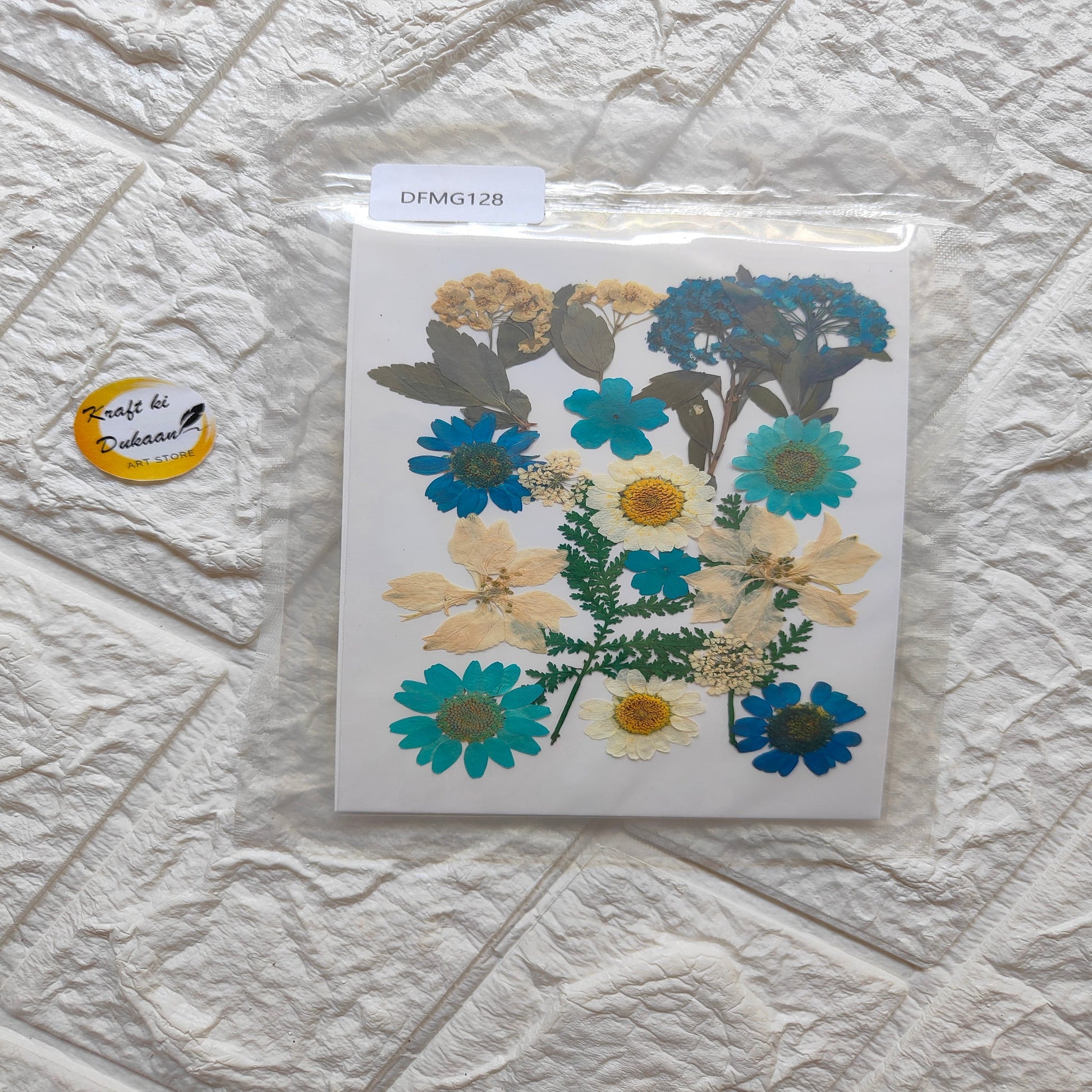 Pressed flower sheet mix for resin art featuring assorted blue and yellow flowers and leaves