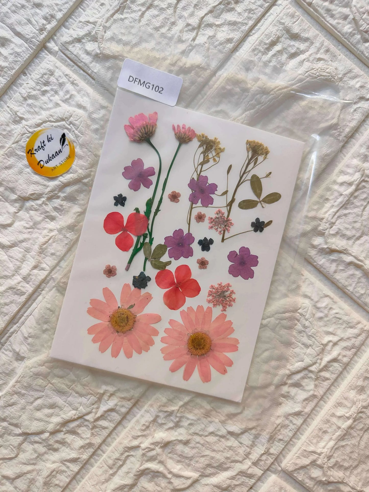 Pressed Flower Sheet Mix B31 with assorted pressed pink and red flowers on white sheet