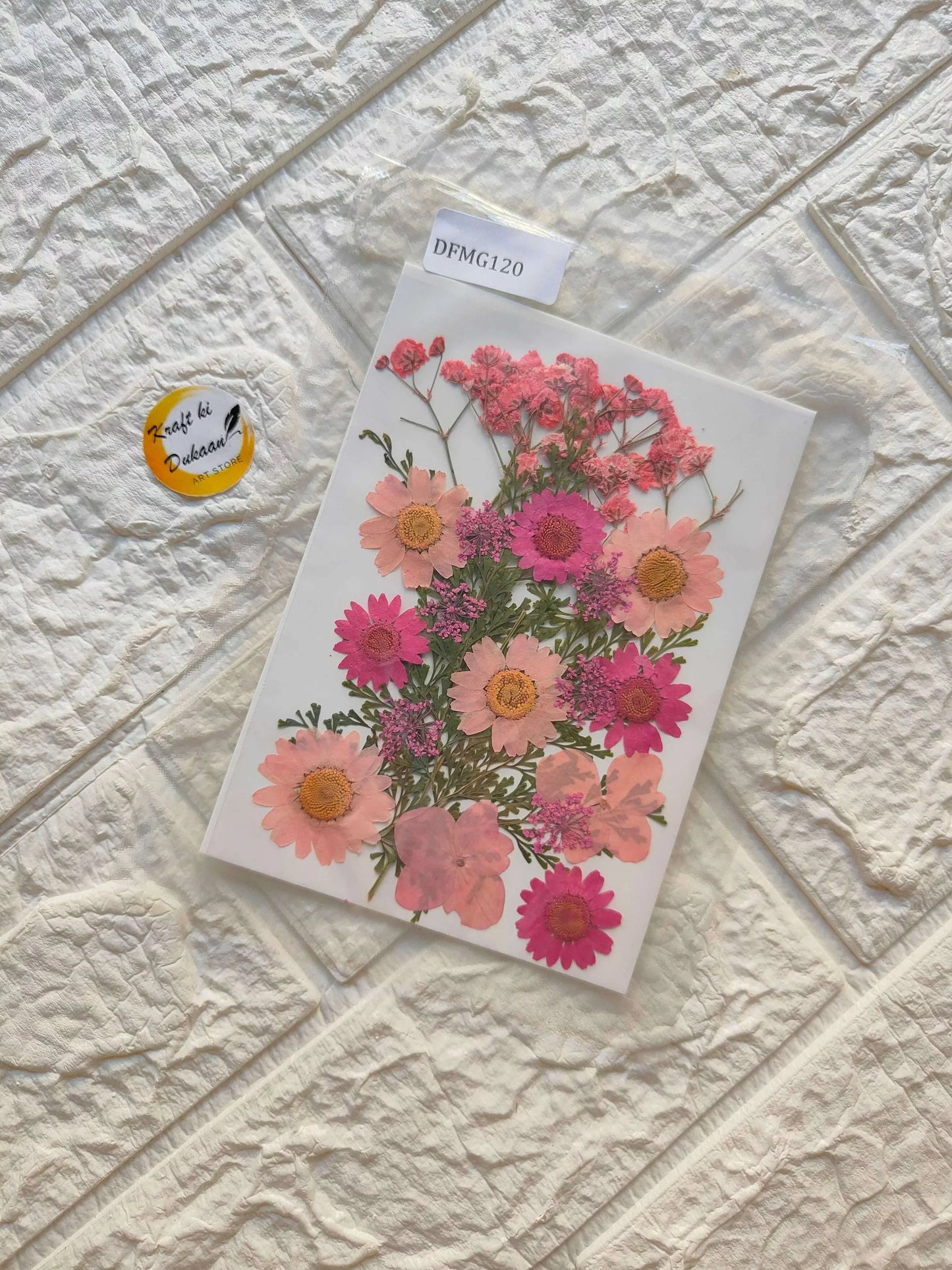 Pressed Flower Sheet Mix B19 with pink and peach dried flowers on a card