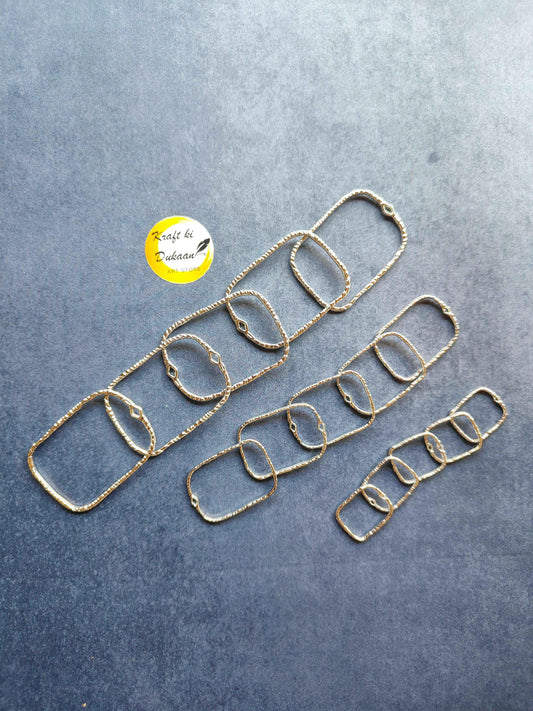 Rectangle shape bezel settings in silver tone with linked frames rows