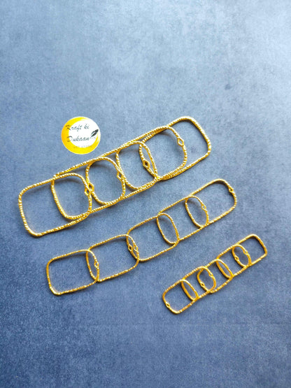 Gold rectangle bezel set, linked chain with 15 rectangular frames