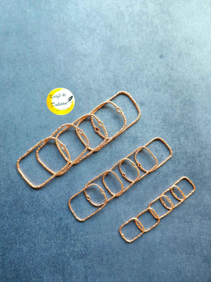 Rose gold rectangle bezel set, linked chain of 15 rectangular frames