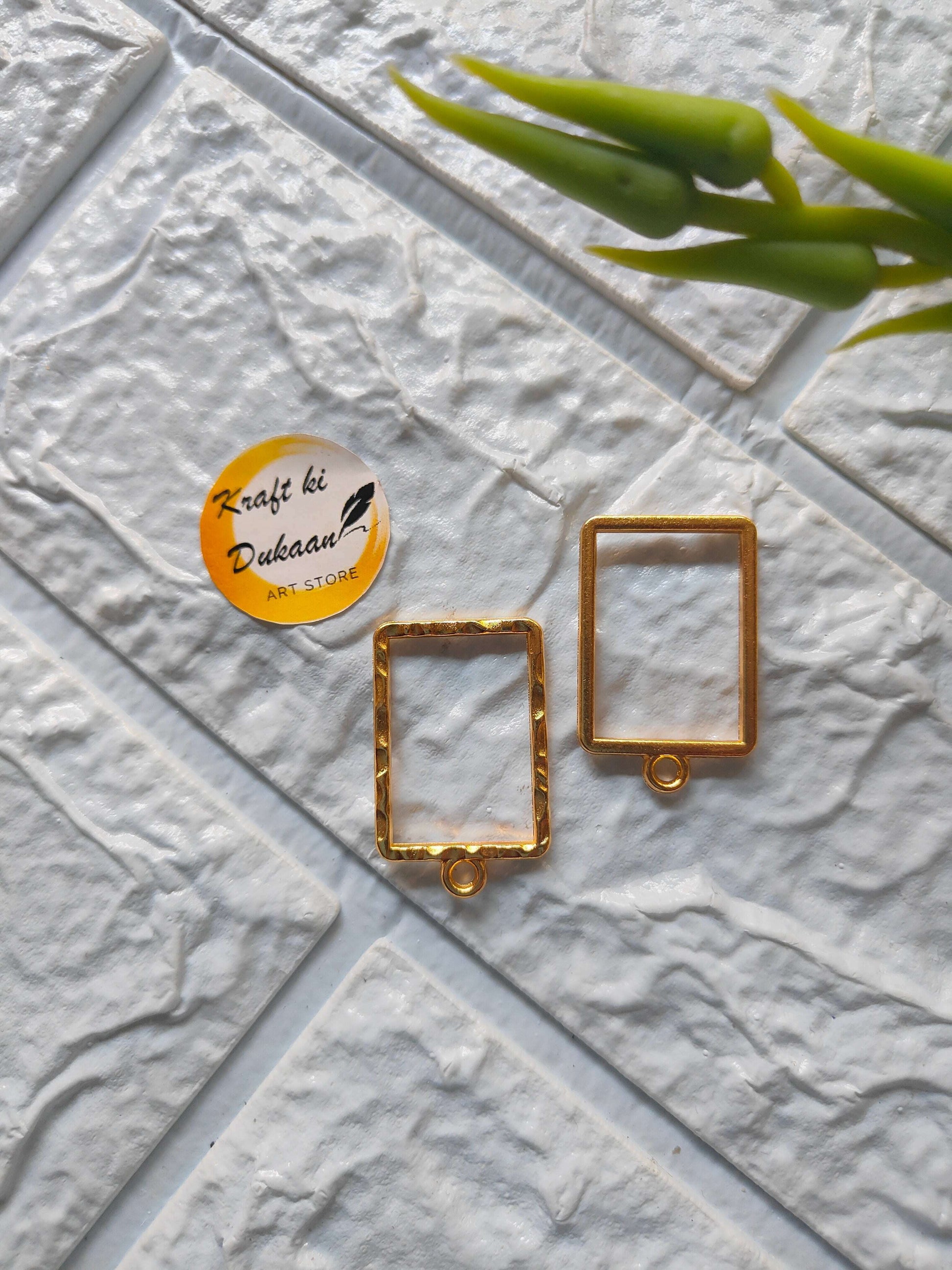 rectangle-bezel-pendant-set-gold-metal-frame