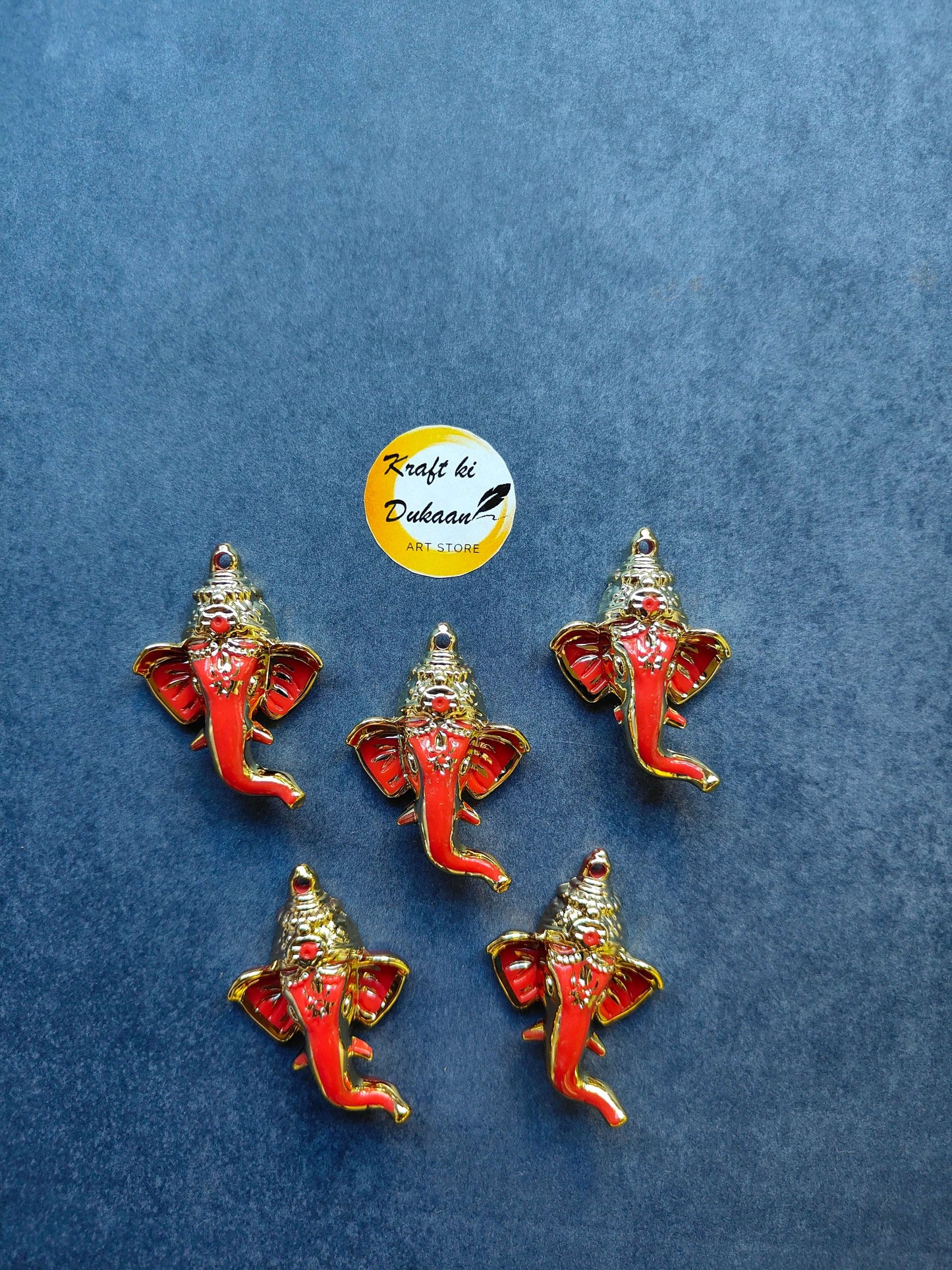 red-ganpati-face-charms-gold-outlined-group