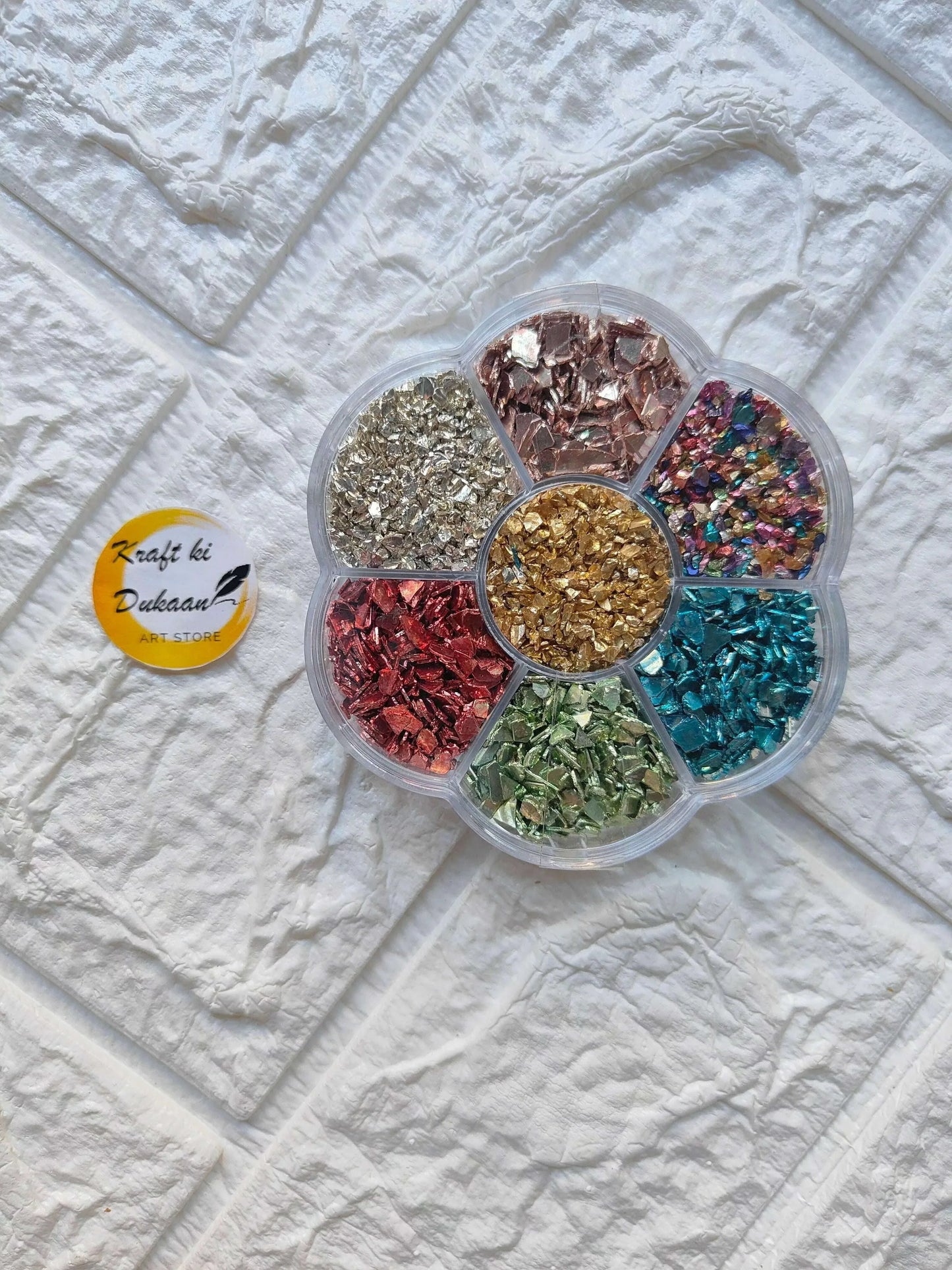 Resin art stone chips box with colorful decorative flakes for crafting and artwork projects