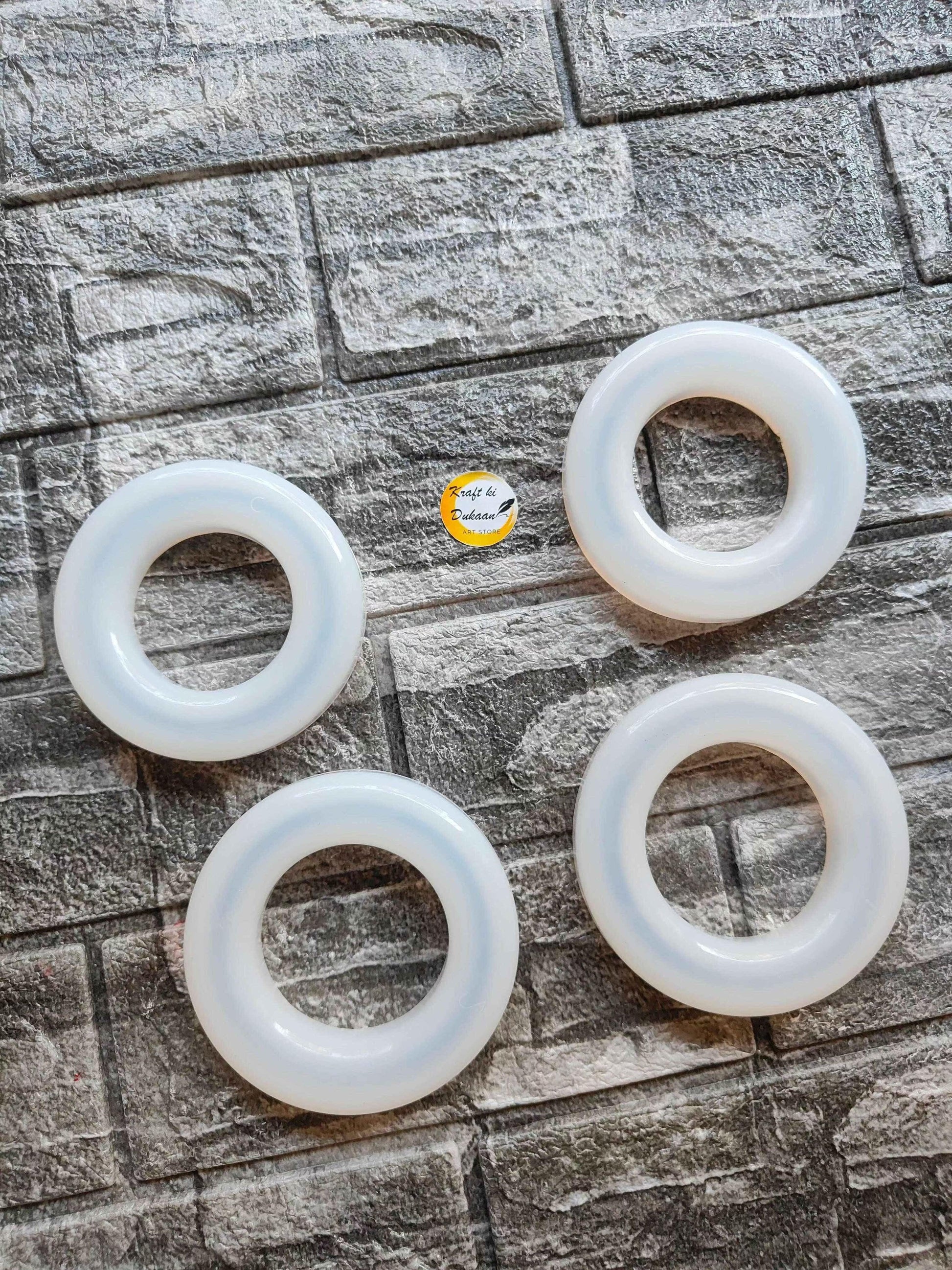 Round bangle set: four light-blue 15mm rings
