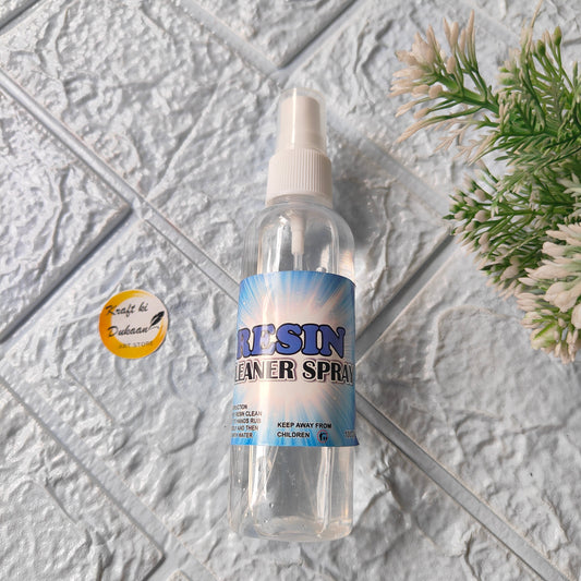 Kraft ki Dukaan Resin Cleaner Spray in a clear bottle for effective cleaning solutions