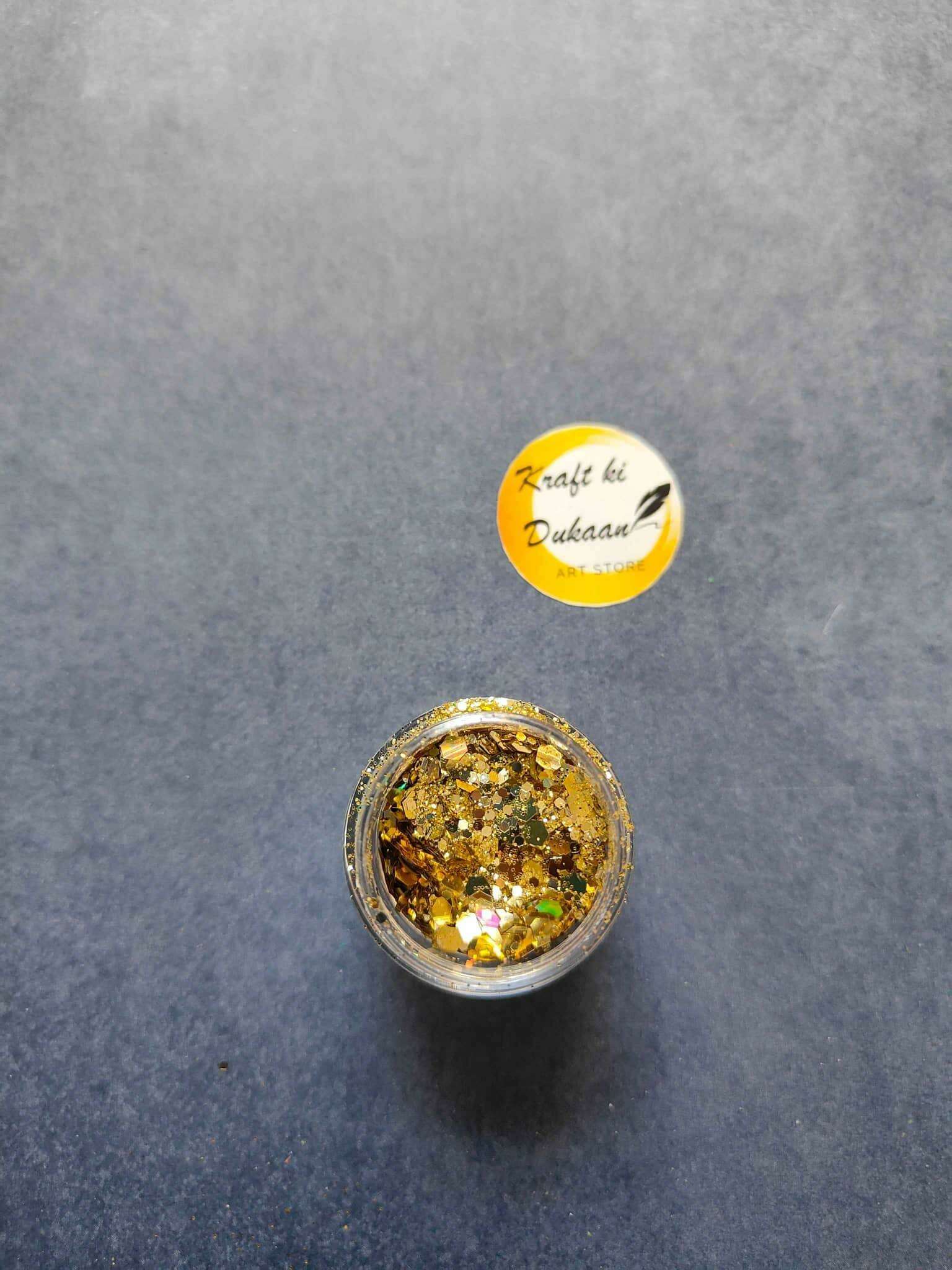 Single jar of resin glitter hexagon mix with golden hexagonal flakes