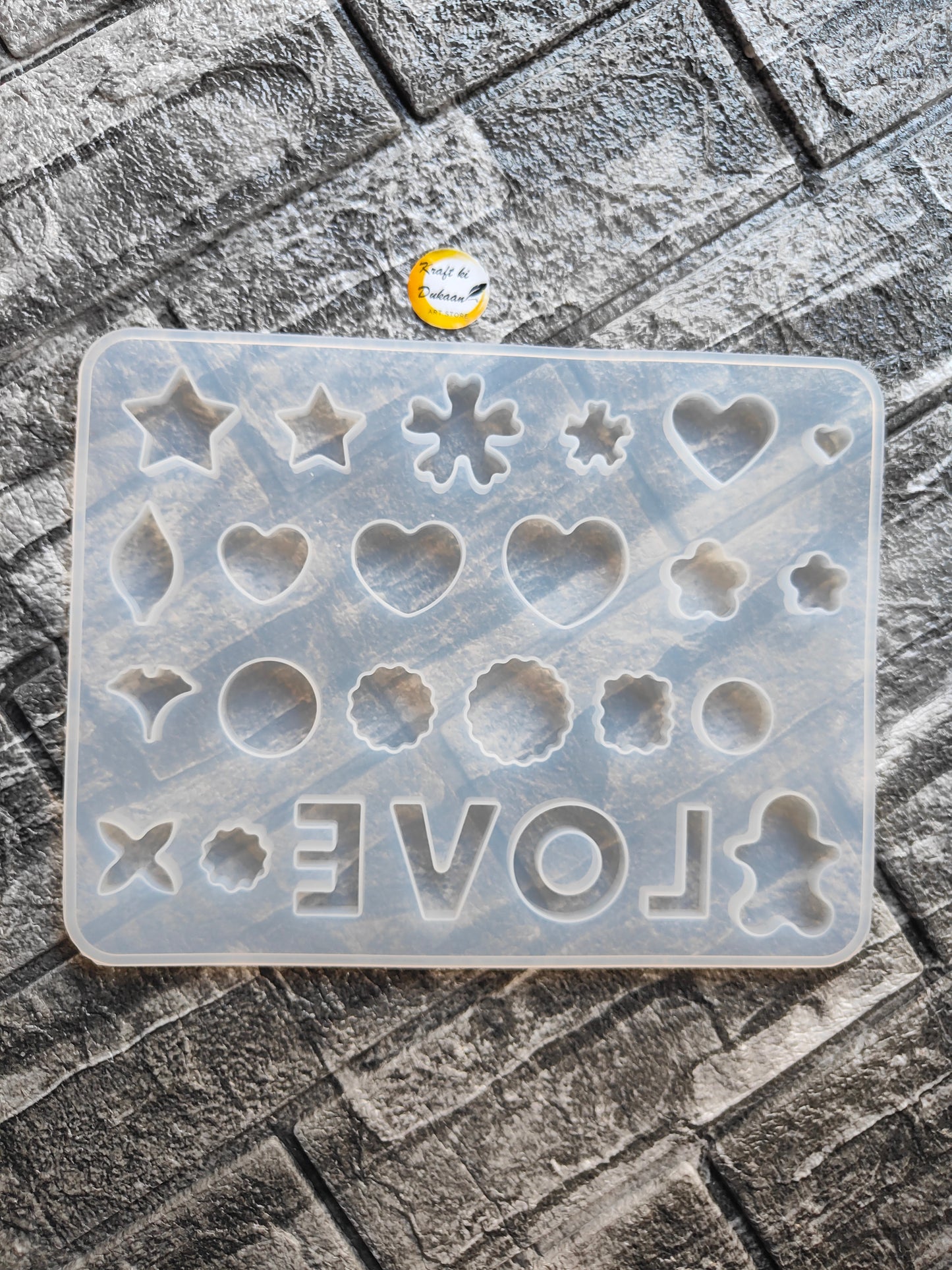 Silicone resin jewellery making mould with various shapes including hearts and stars