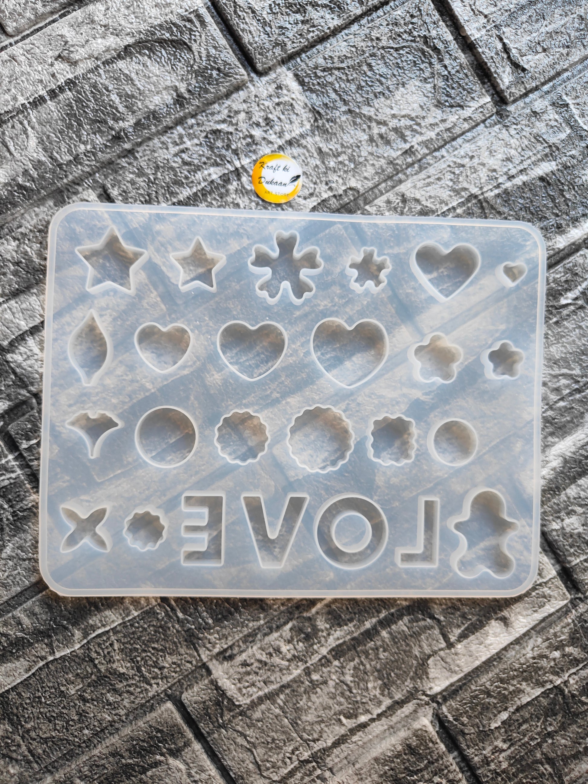 Silicone resin jewellery making mould with various shapes including hearts and stars