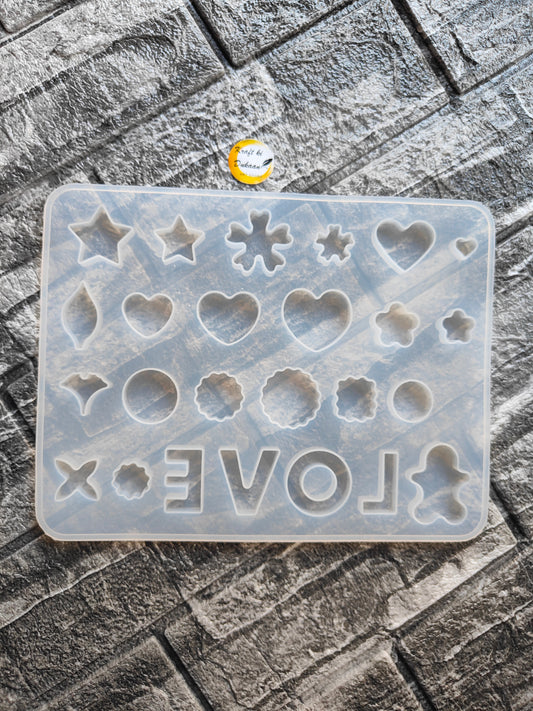 Silicone resin jewellery making mould with various shapes including hearts and stars