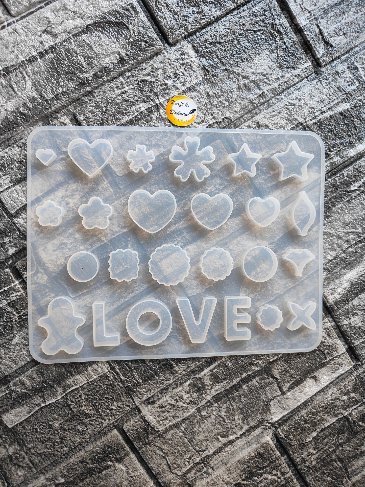 Kraft ki Dukaan resin jewellery making mould with various shapes like hearts and stars