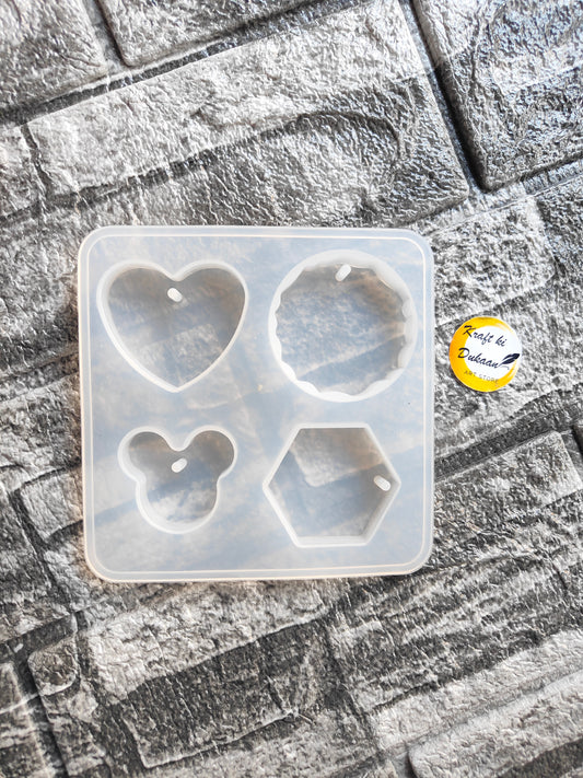Silicone resin keychain mould with heart, circle, hexagon, and bear designs for crafting keychains