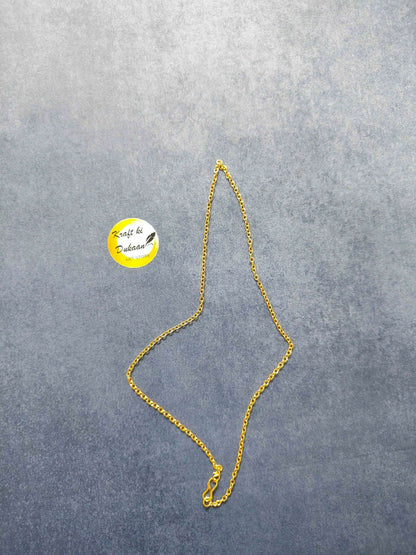 Gold short chain necklace, teardrop-style chain with clasp detail laid out