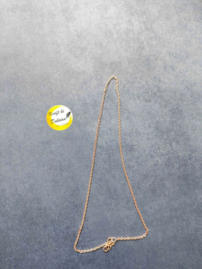 Rose gold short chain necklace, teardrop-style chain with clasp detail laid out