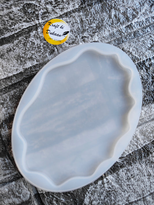 Oval resin tray mold 13cm x 11cm with decorative edge design for crafting projects