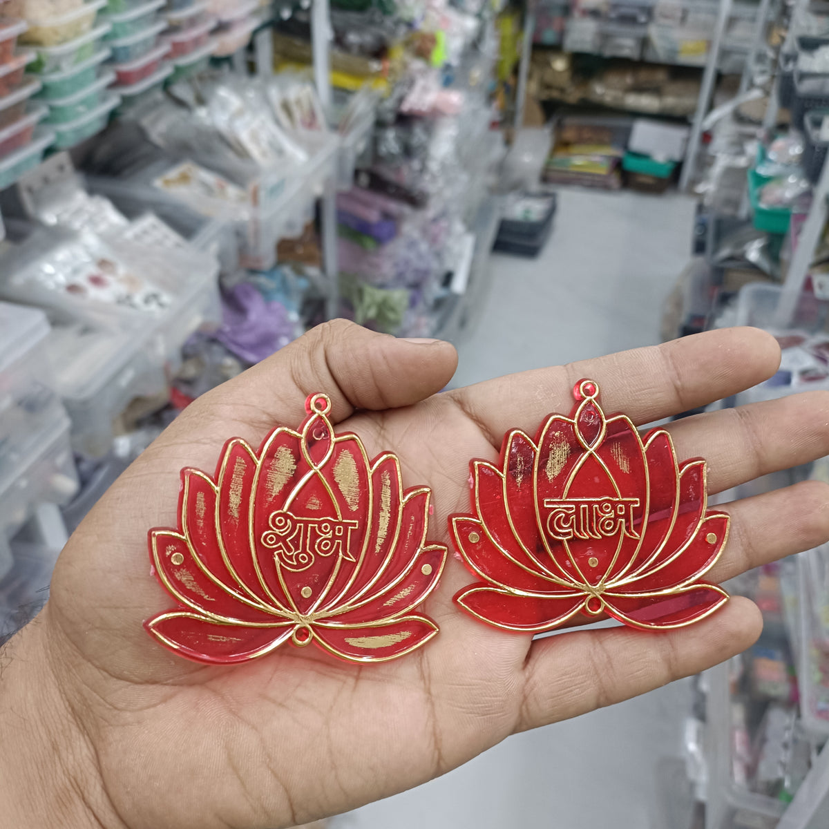 Red acrylic lotus earrings with dangling charm and small top loop, Shubh Labh style
