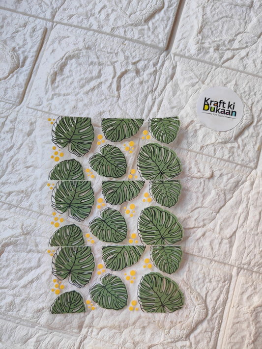UV DTF peel-off sticker sheet with green monstera leaves and yellow dots, Kraft ki Dukaan
