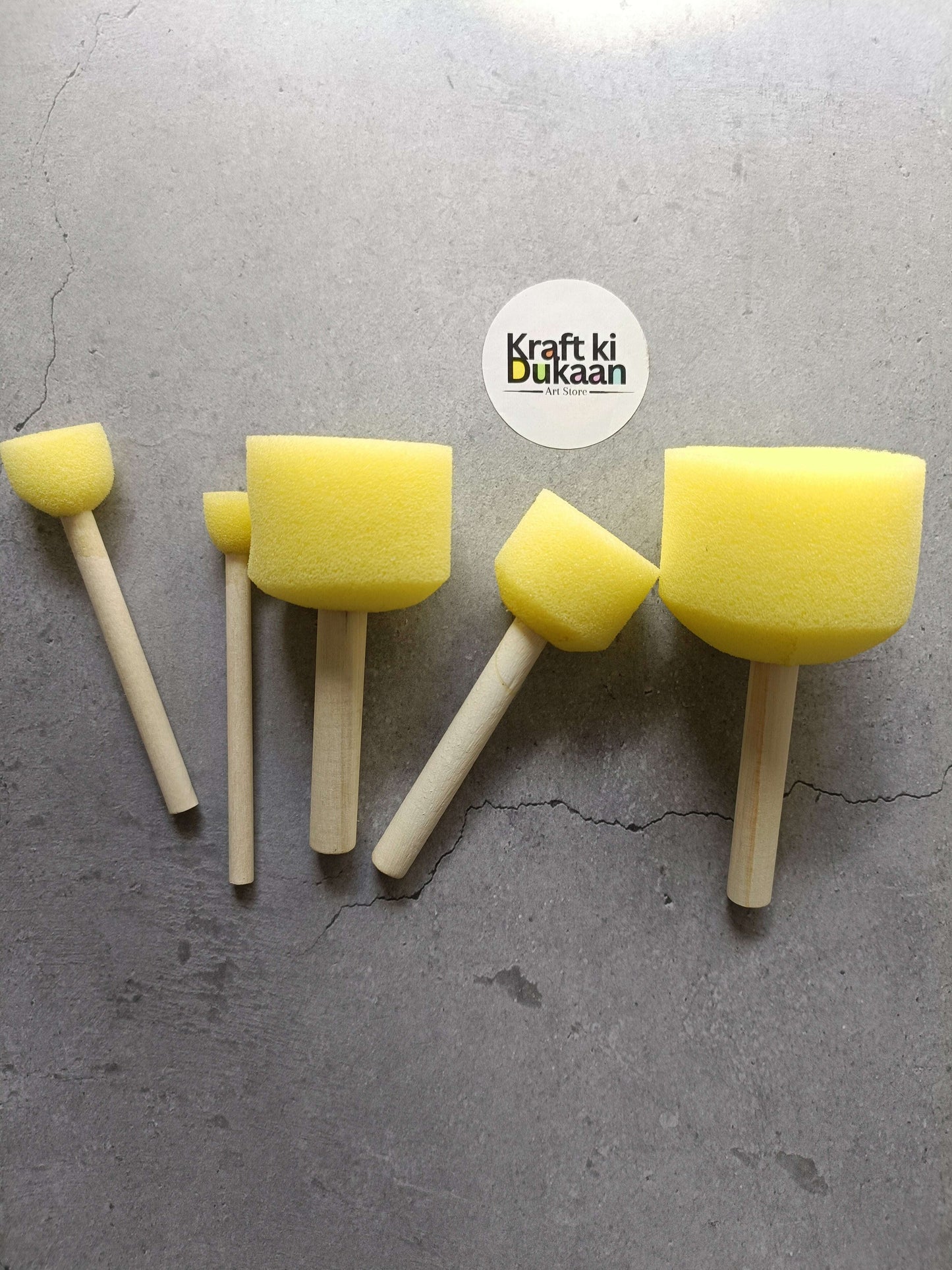 Yellow sponge paint brushes on wooden handles, 5-piece set