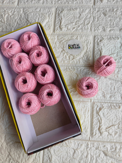 Rakhi thread spool set in pale pink-lilac, open box with several thread balls