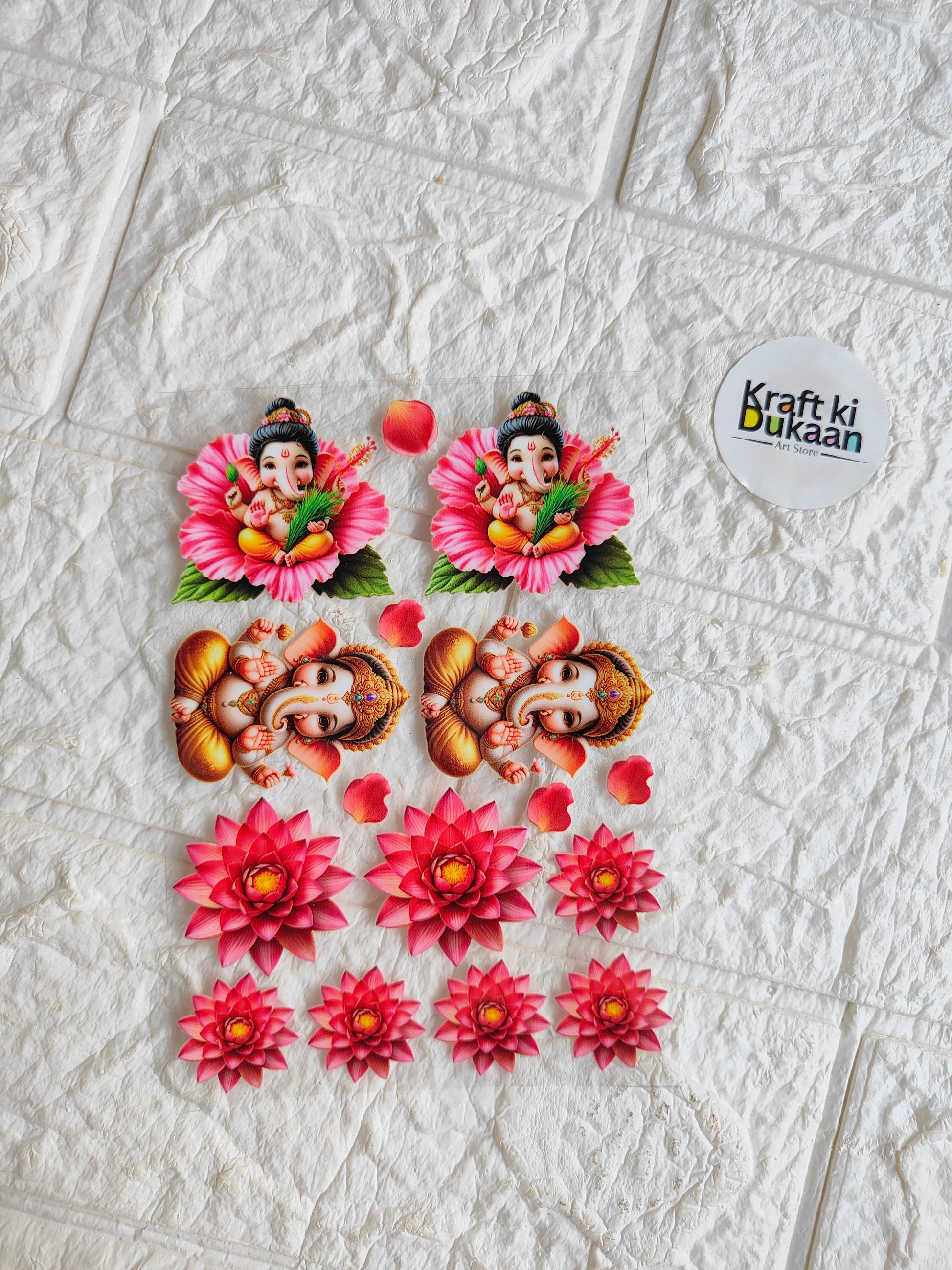 Peel-off sticker sheet with pink floral and Ganesh-style decorative motifs