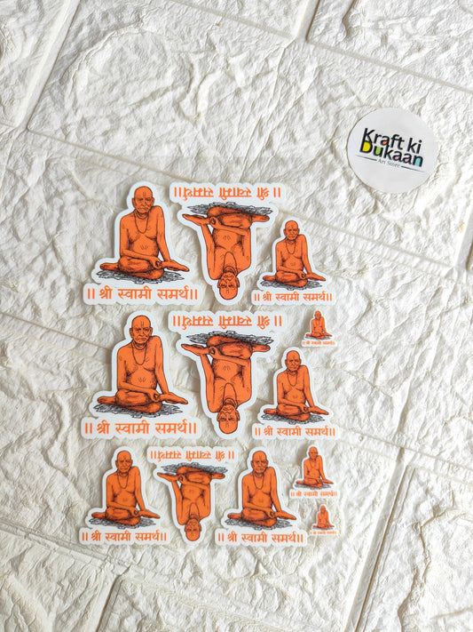 Peel-off sticker sheet with multiple orange figure decals and small text labels