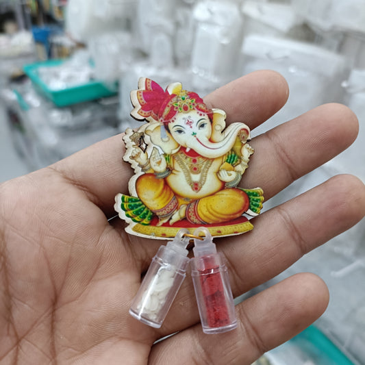 Ganesha-themed mini glass bottle set, two clear bottles with red contents