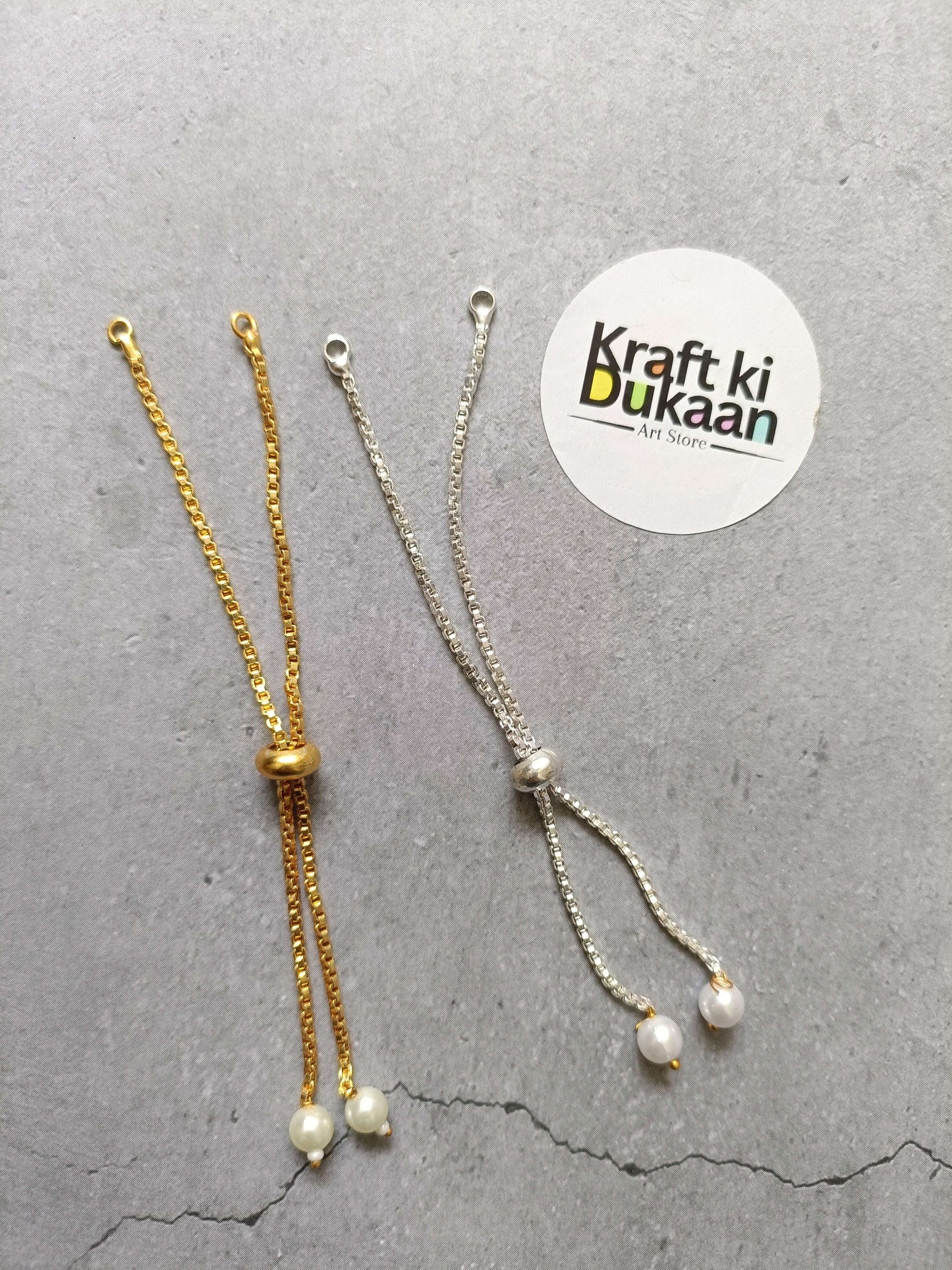 Gold- and silver-tone chain bracelet set with pearl drop charms