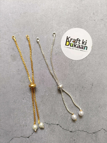 Gold- and silver-tone chain bracelet set with pearl drop charms