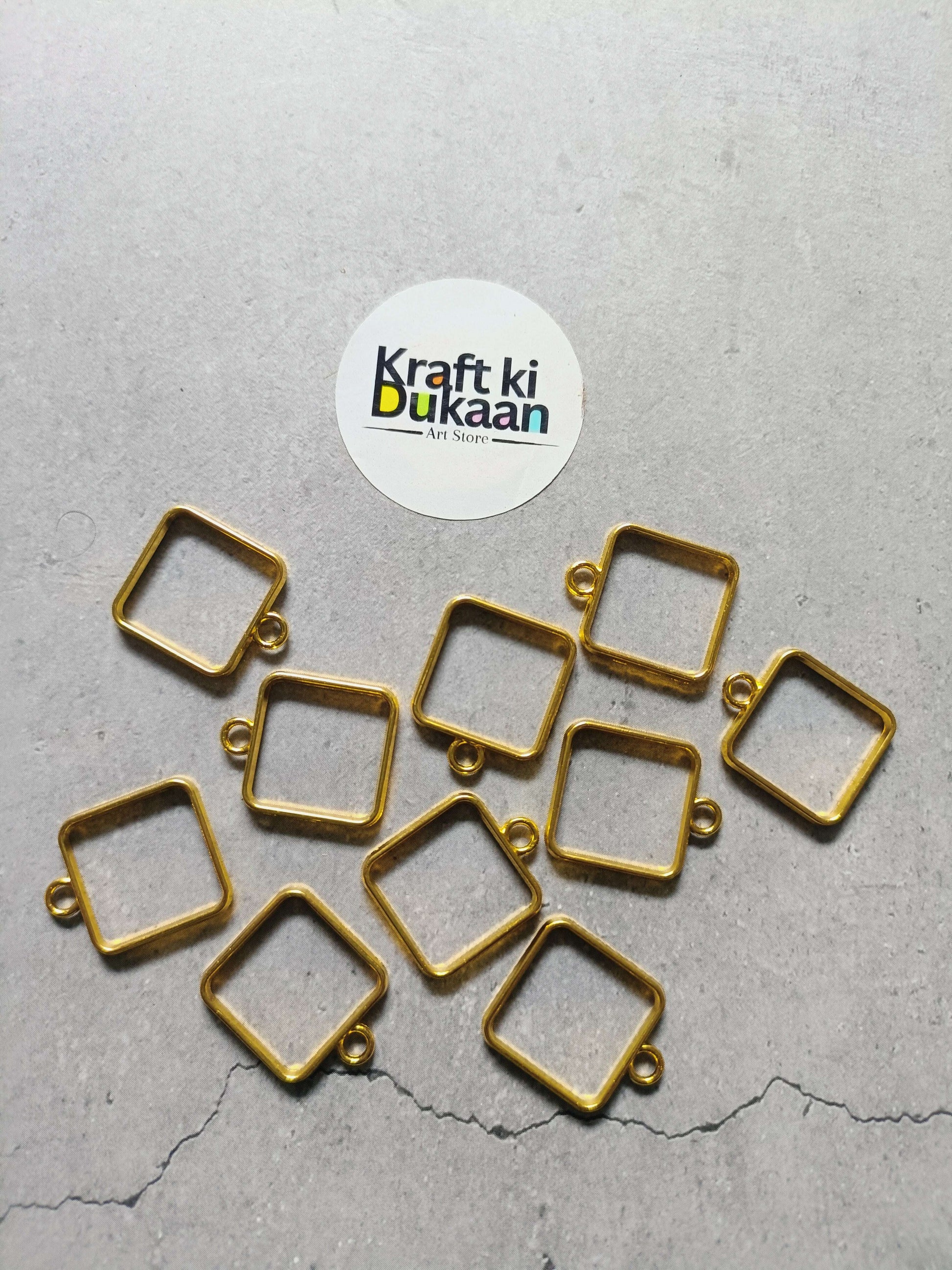 Square bezel pendant set of 10, gold-toned square frames with small loops