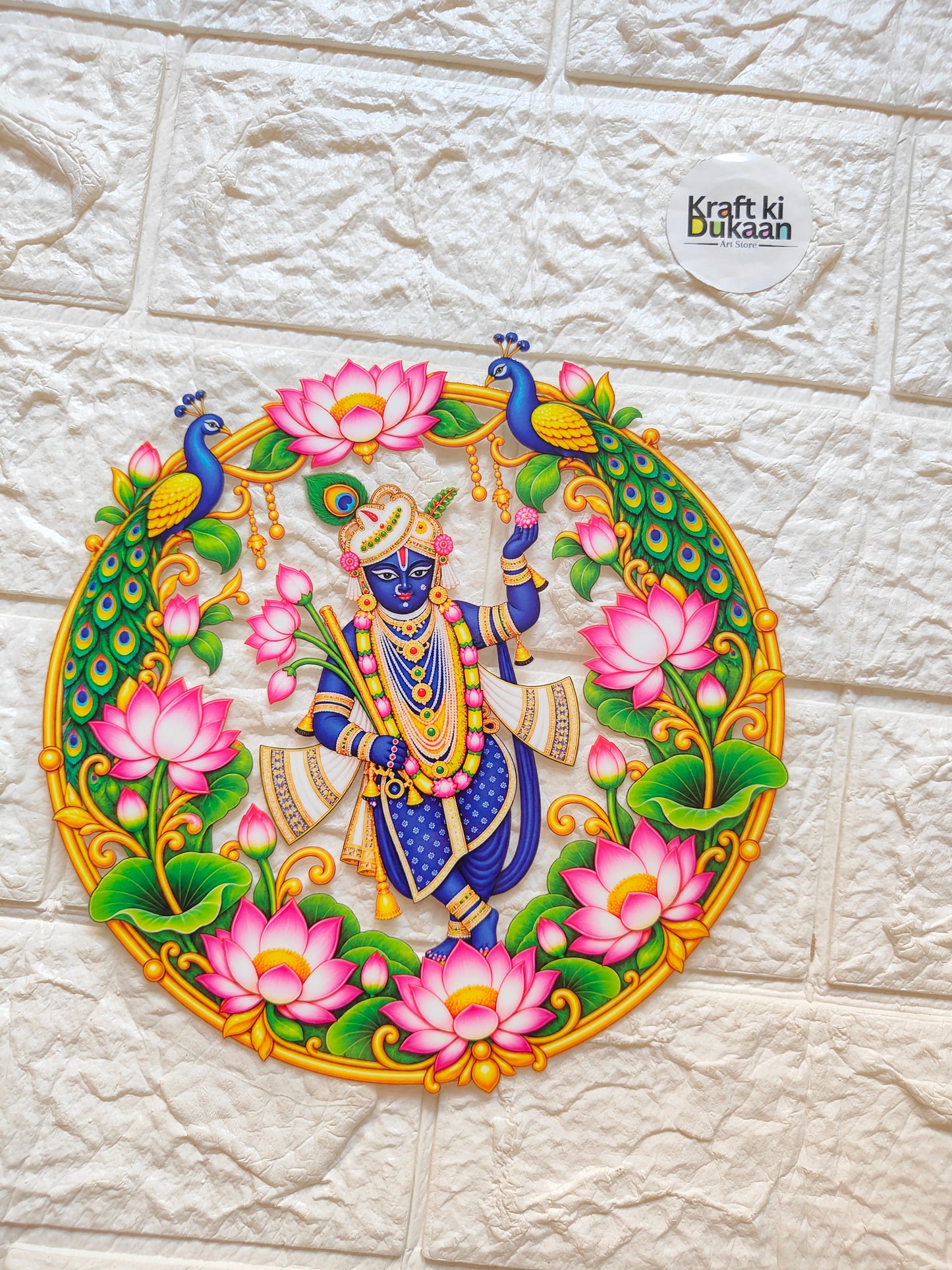 Round peel-off sticker with blue deity, peacocks, and pink lotus flowers