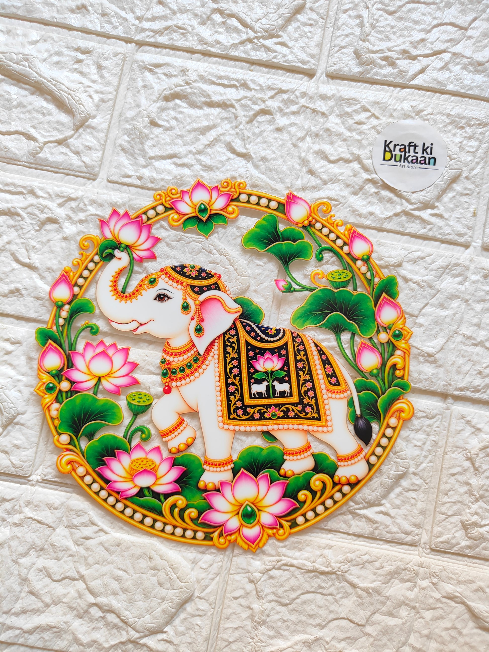 Round peel-off sticker with colorful elephant motif in green and orange floral border