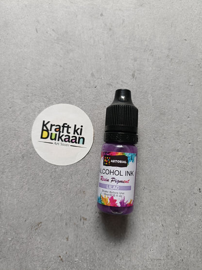 Alcohol ink bottle with black cap, lilac resin pigment label