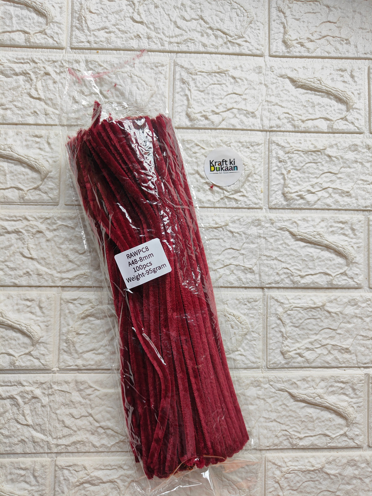 Burgundy red pipe cleaners, 8mm stems, in clear plastic packaging with label