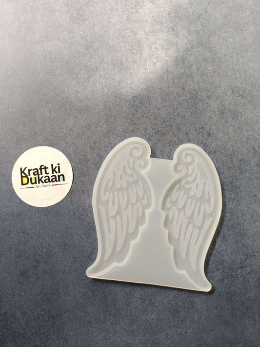 Clear plastic angel wings mould with two cavity design