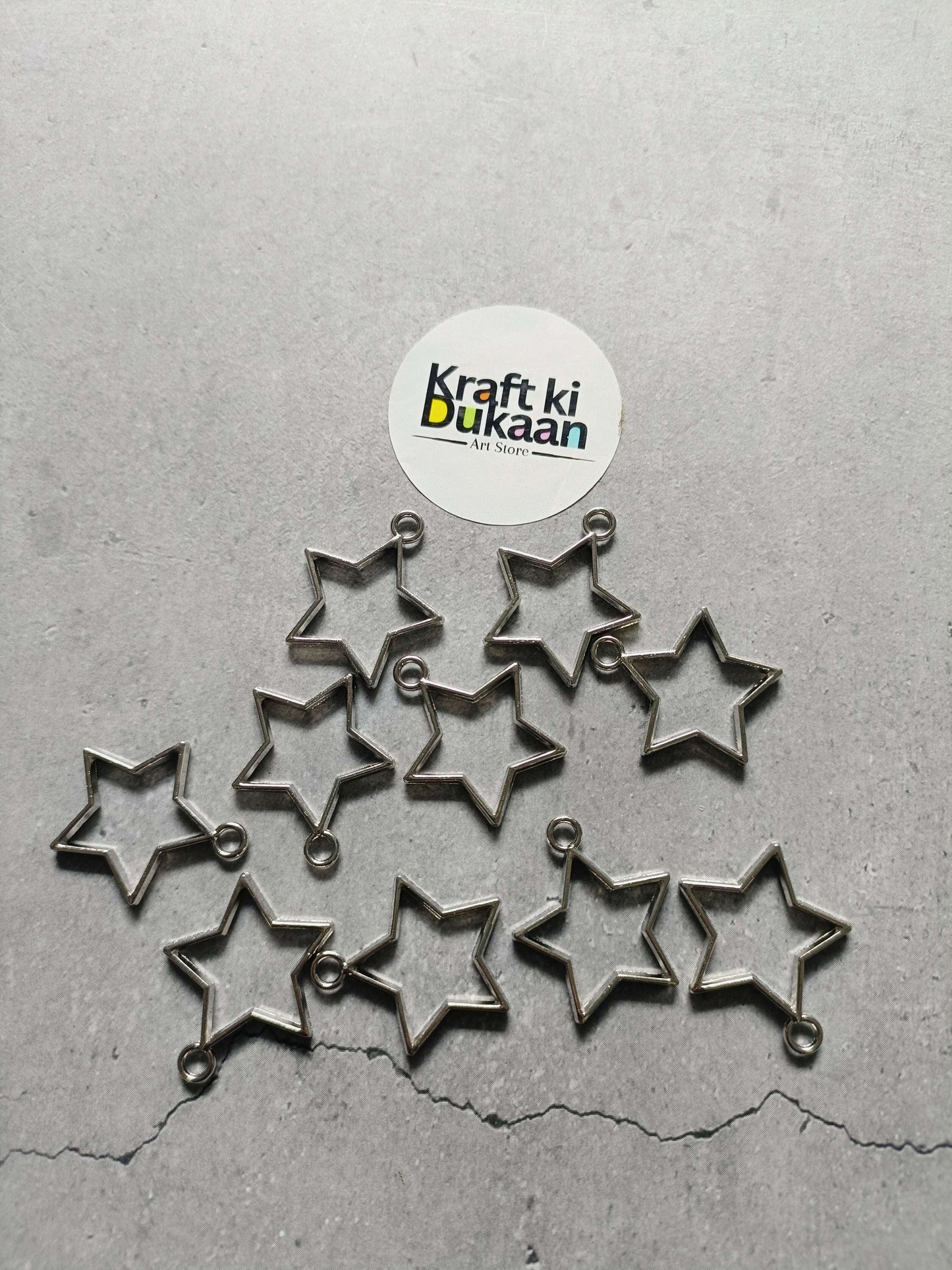 Star bezel pendant set of 10, silver-tone star charms with loop backs