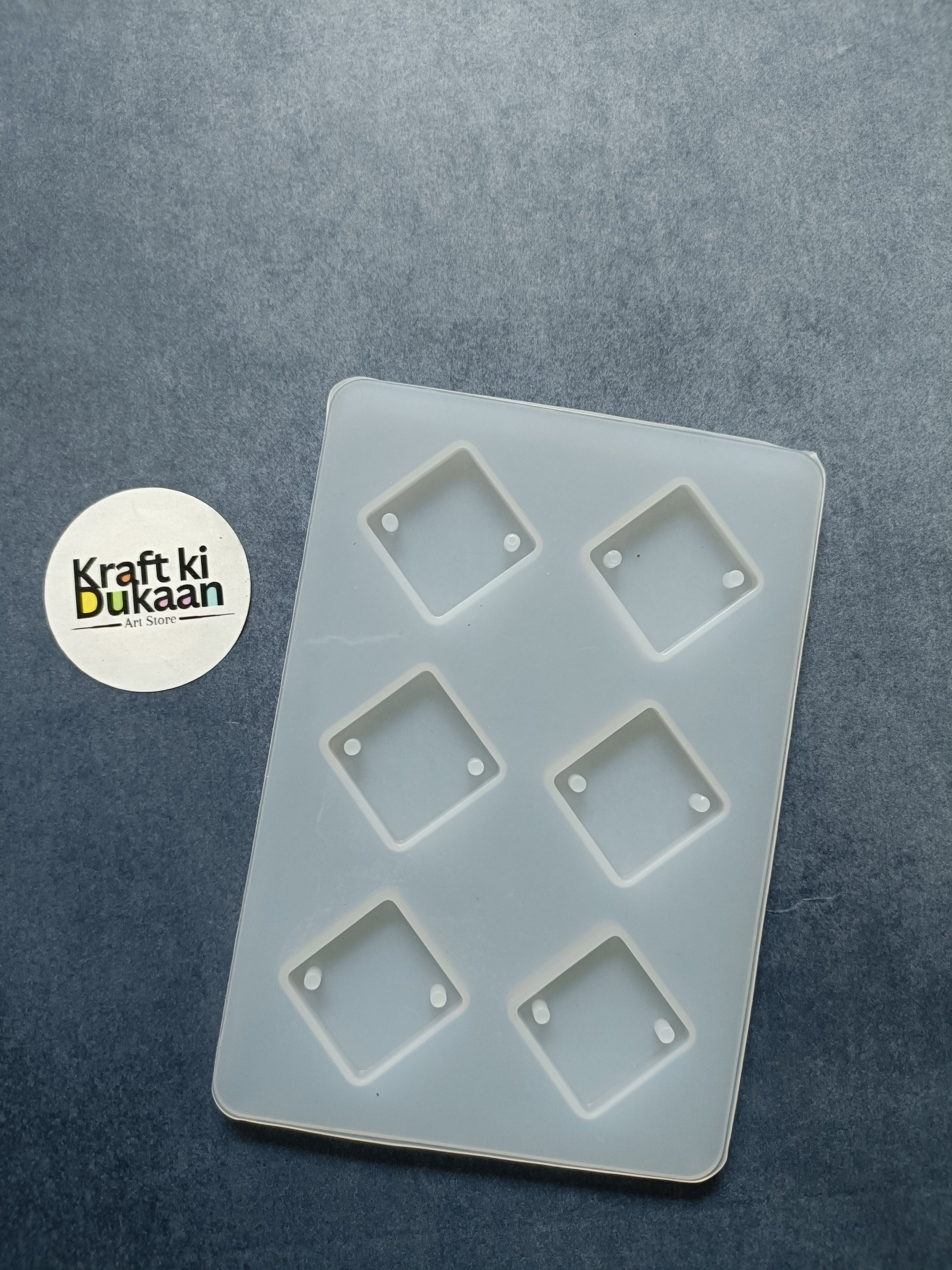 6-cavity rhombus rakhi mould with six diamond cavities and small end holes