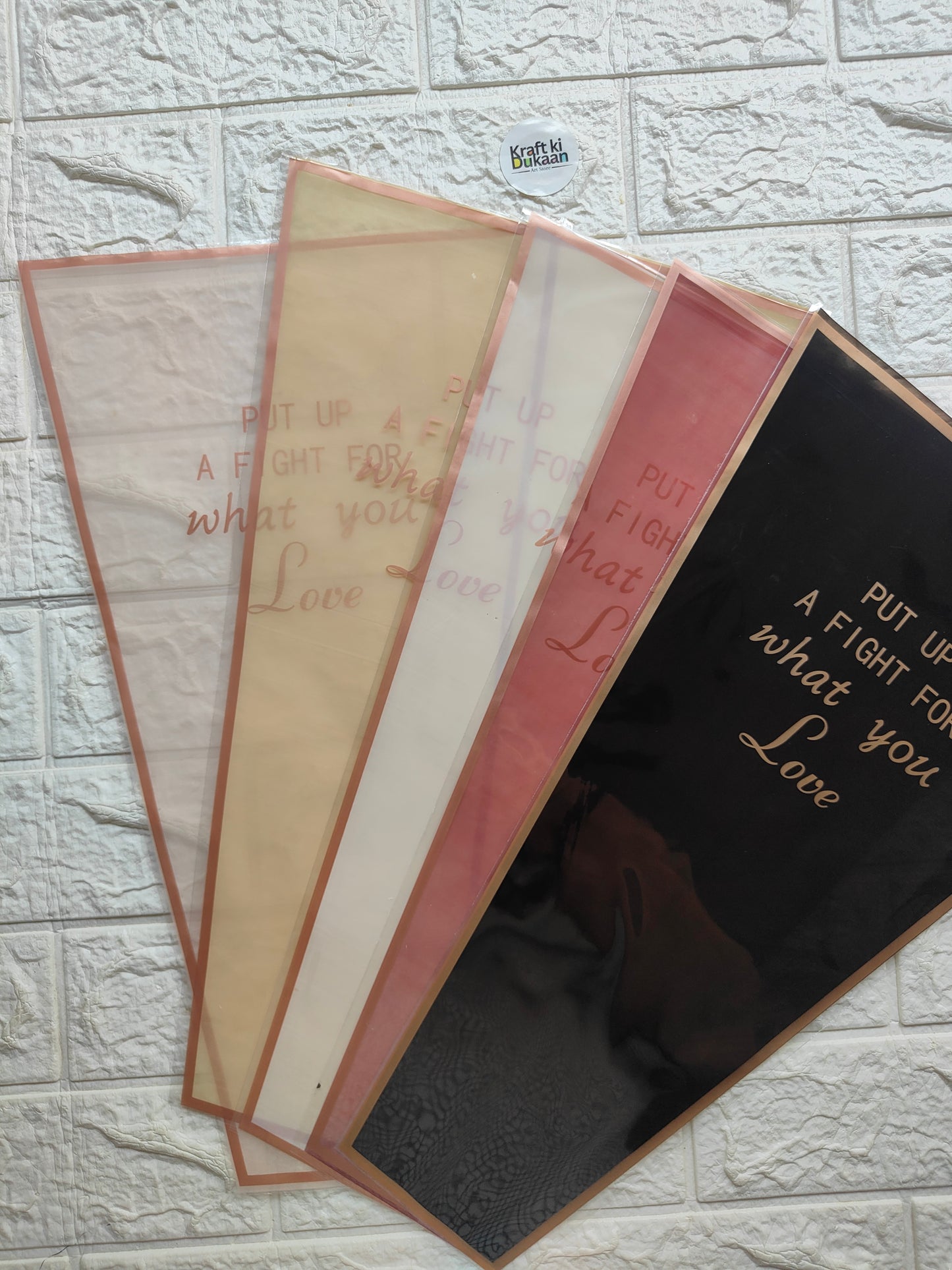 Bouquet cover sleeve, translucent beige, pink, and dark; orange trim, text design