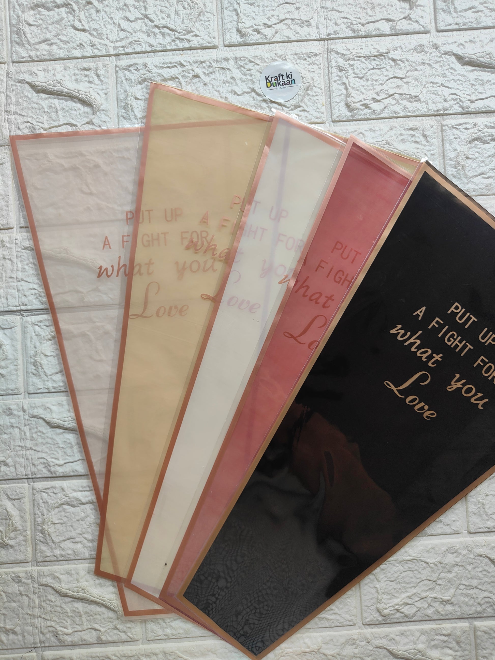 Bouquet cover sleeve, translucent beige, pink, and dark; orange trim, text design