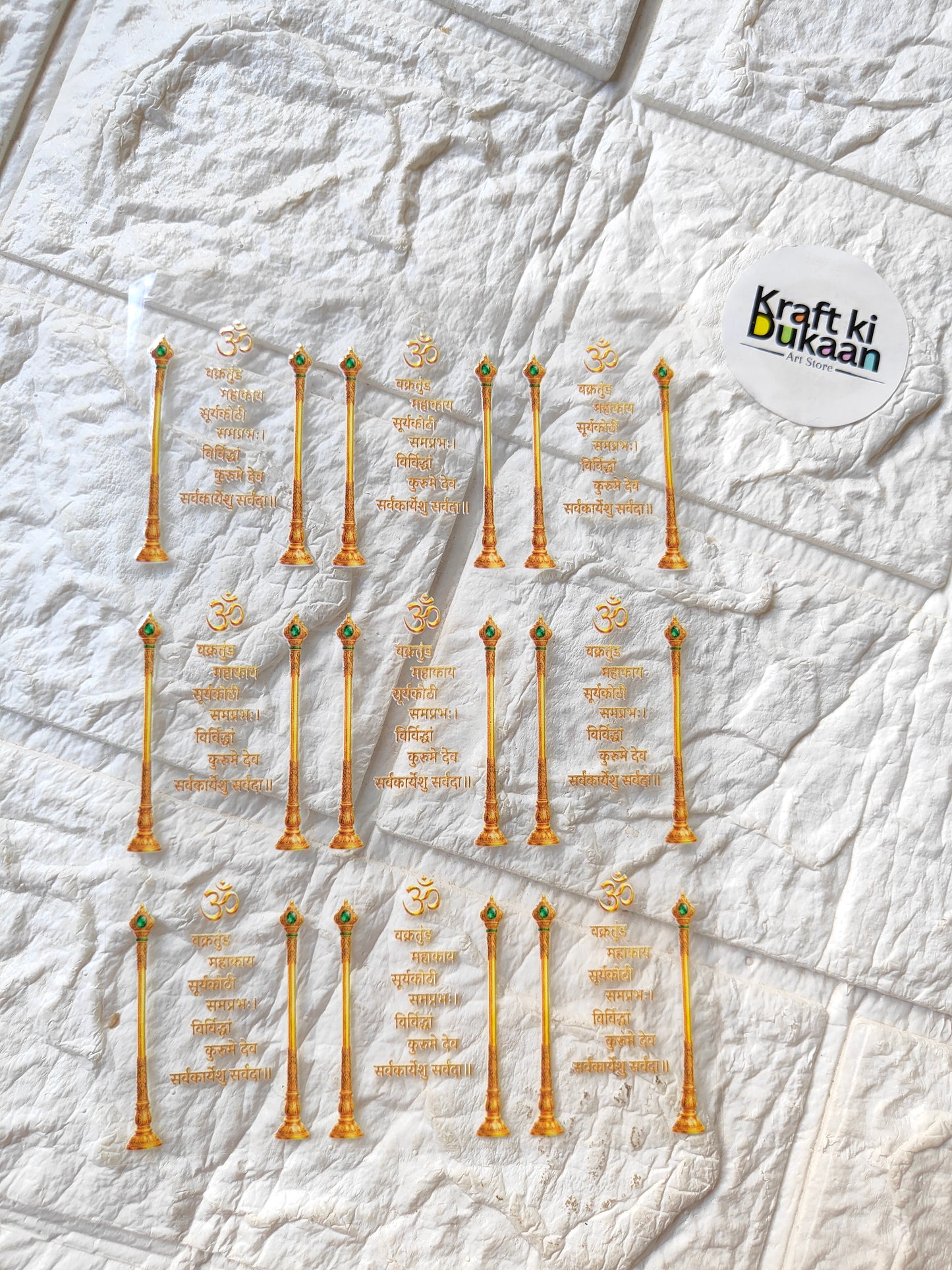 UV DTF peel-off sticker sheet with multiple gold candle motif stickers