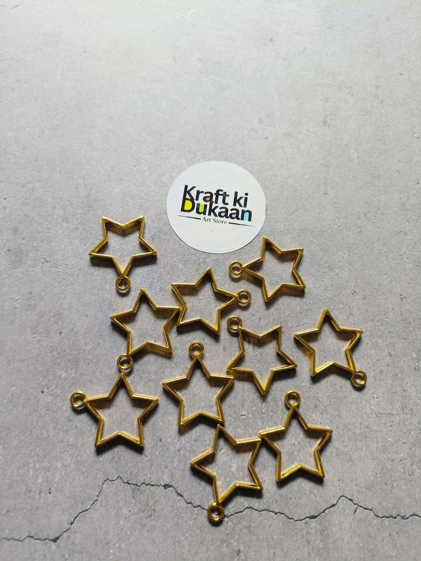 Star bezel pendant set of 10, gold-tone star charms with loop backs