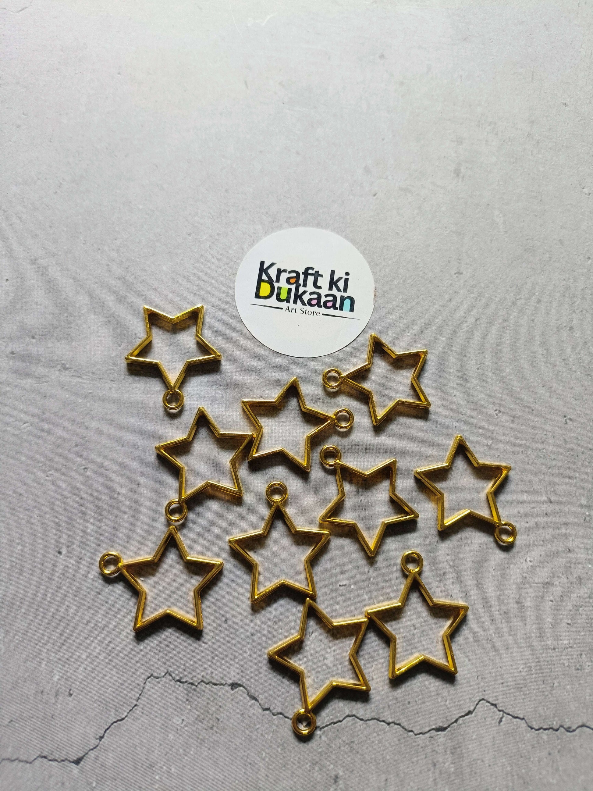 Star bezel pendant set of 10, gold-tone star charms with loop backs