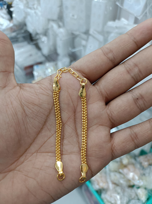 Gold-tone rakhi bracelet chain with oval charm ends