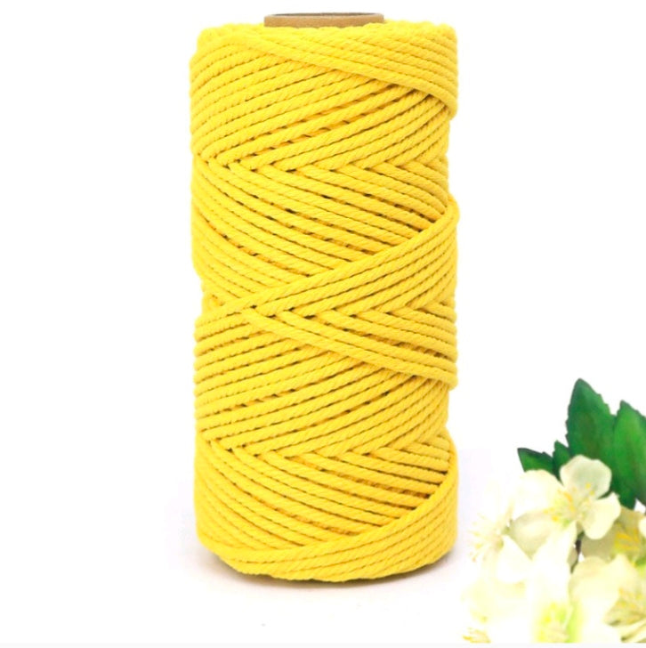 Macrame cotton thread spool, yellow color, 3mm twisted cord wound on a reel