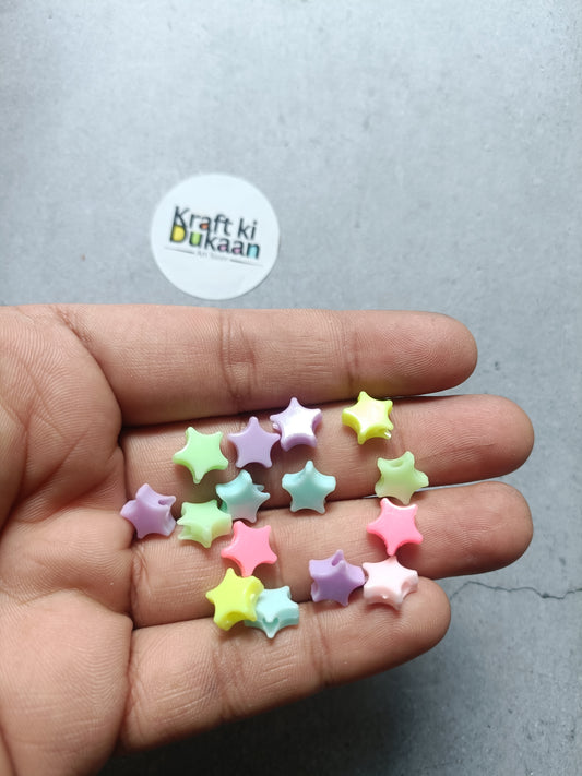 Star-shaped multicolor bracelet beads, 50-pack, in hand