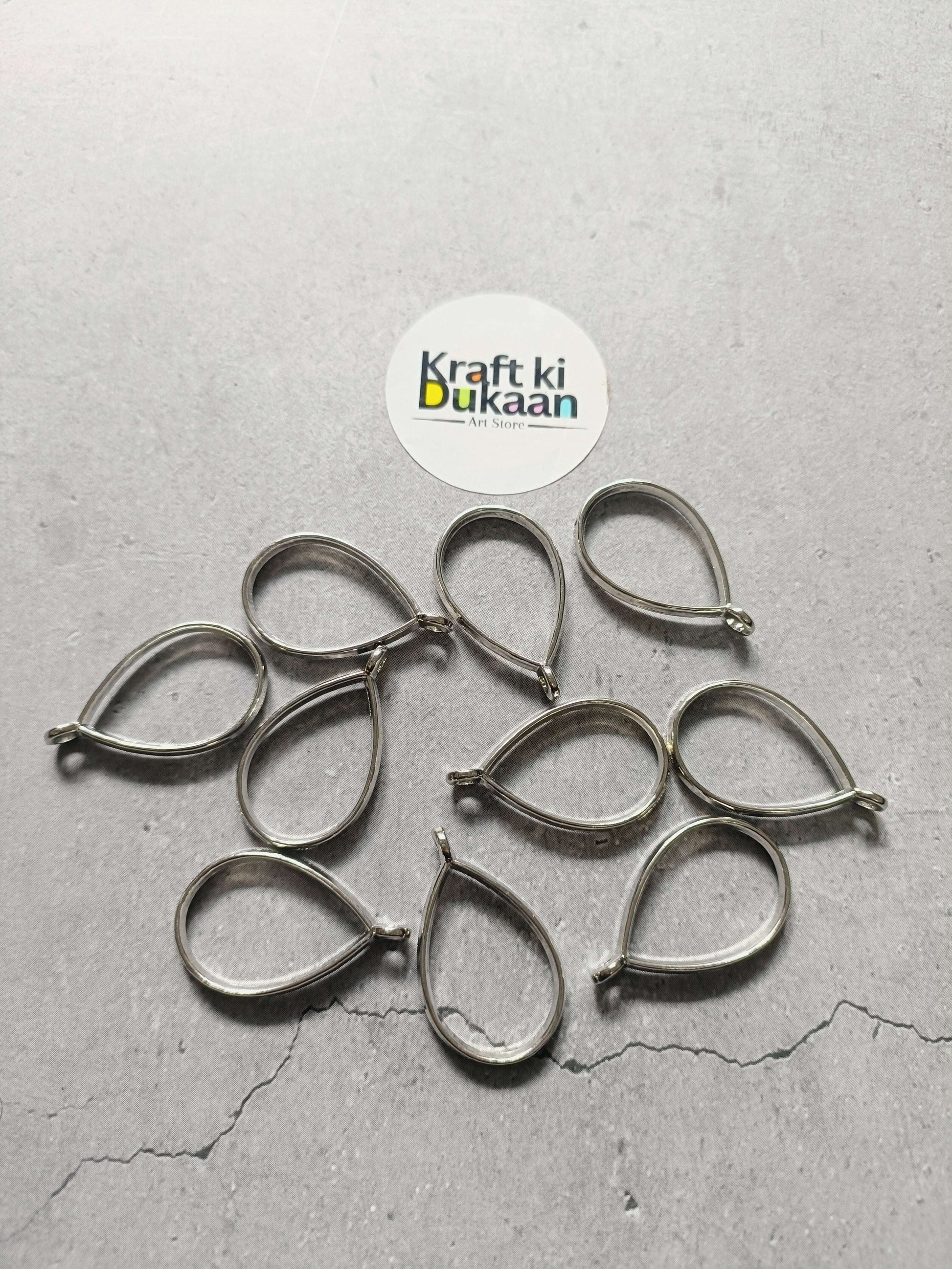 Silver teardrop bezel pendant set, 10-piece with small hanging loops