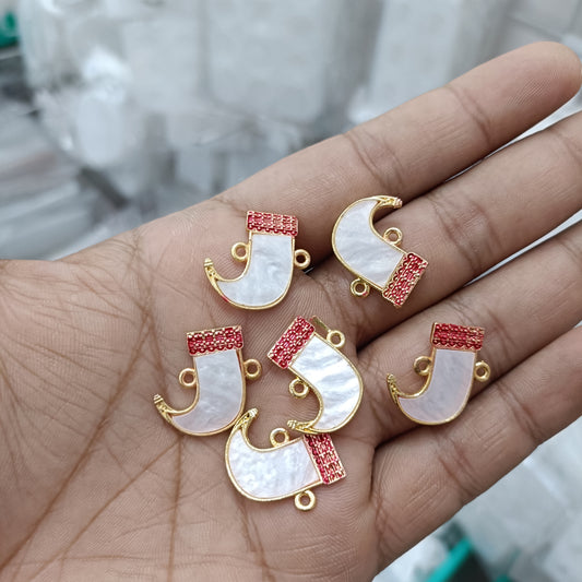 Pack of six gold-tone rakhi pendants with red insets and light blue enamel, clasp loops